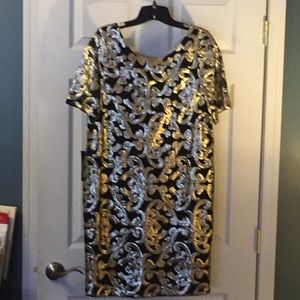 Black and gold sequin dress